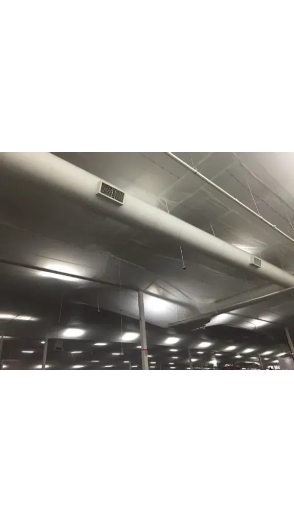 A ventilation pipe near temporary suspended ceiling covers
