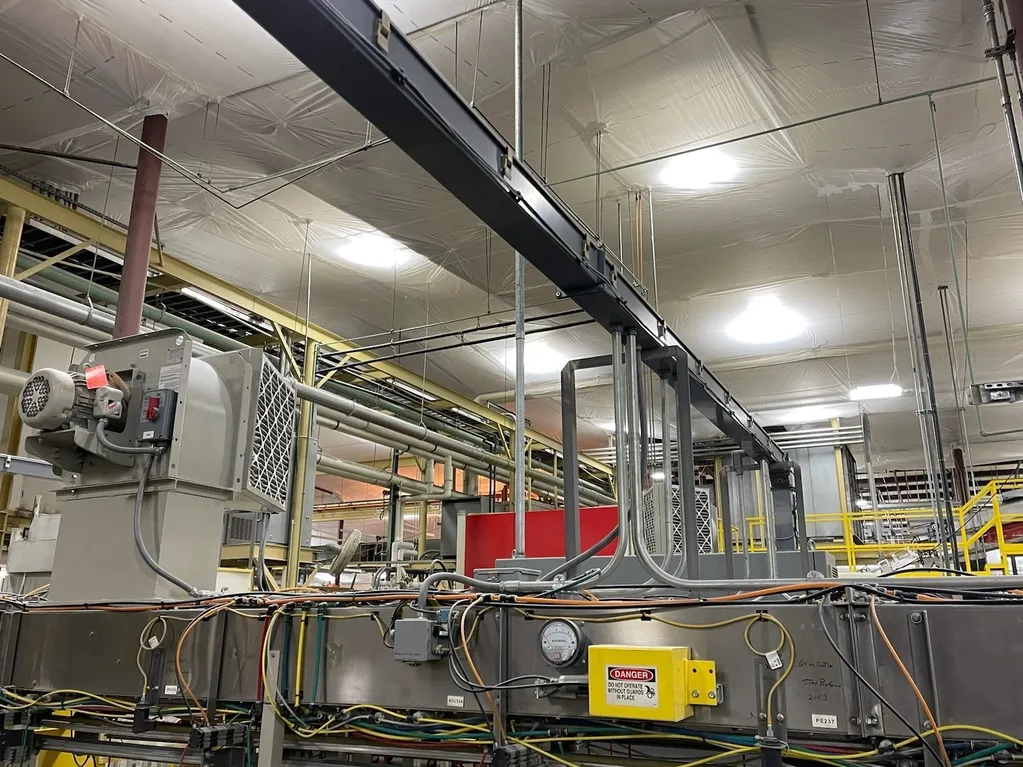 A factory with temporary suspended ceiling covers