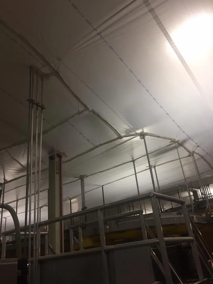 Metal pipes under temporary suspended ceiling covers