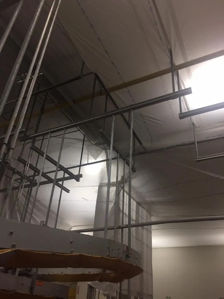 Inside a factory with temporary suspended ceiling covers