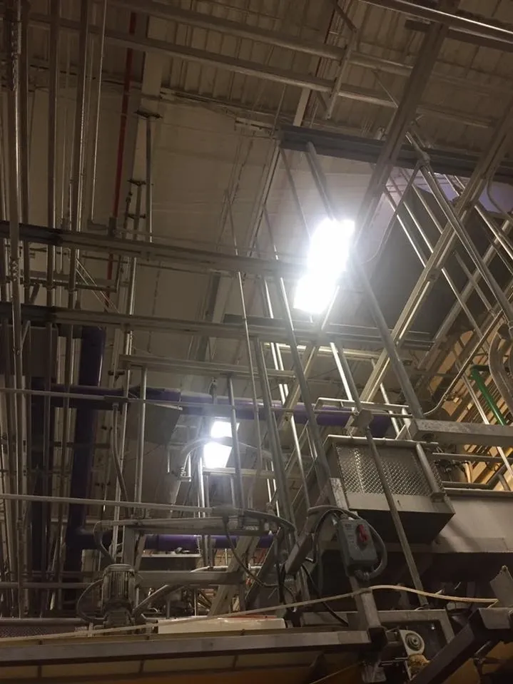 A manufacturing site with temporary suspended ceiling covers
